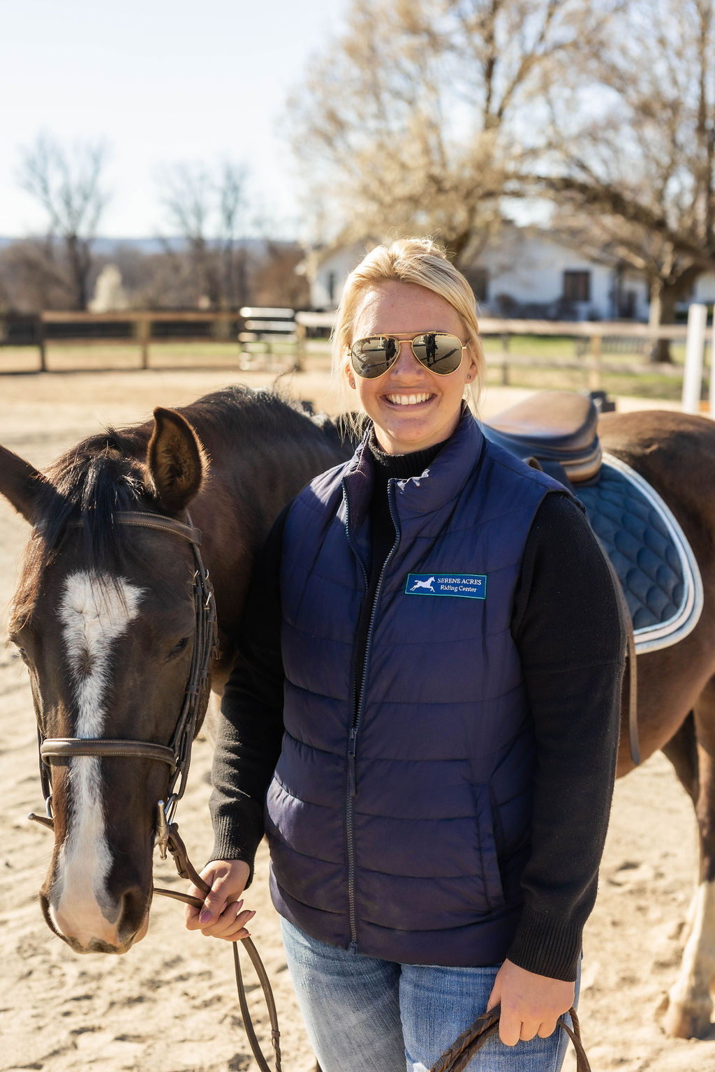 Olivia Smith, owner and head instructor of Serene Acres Riding Center, with a horse